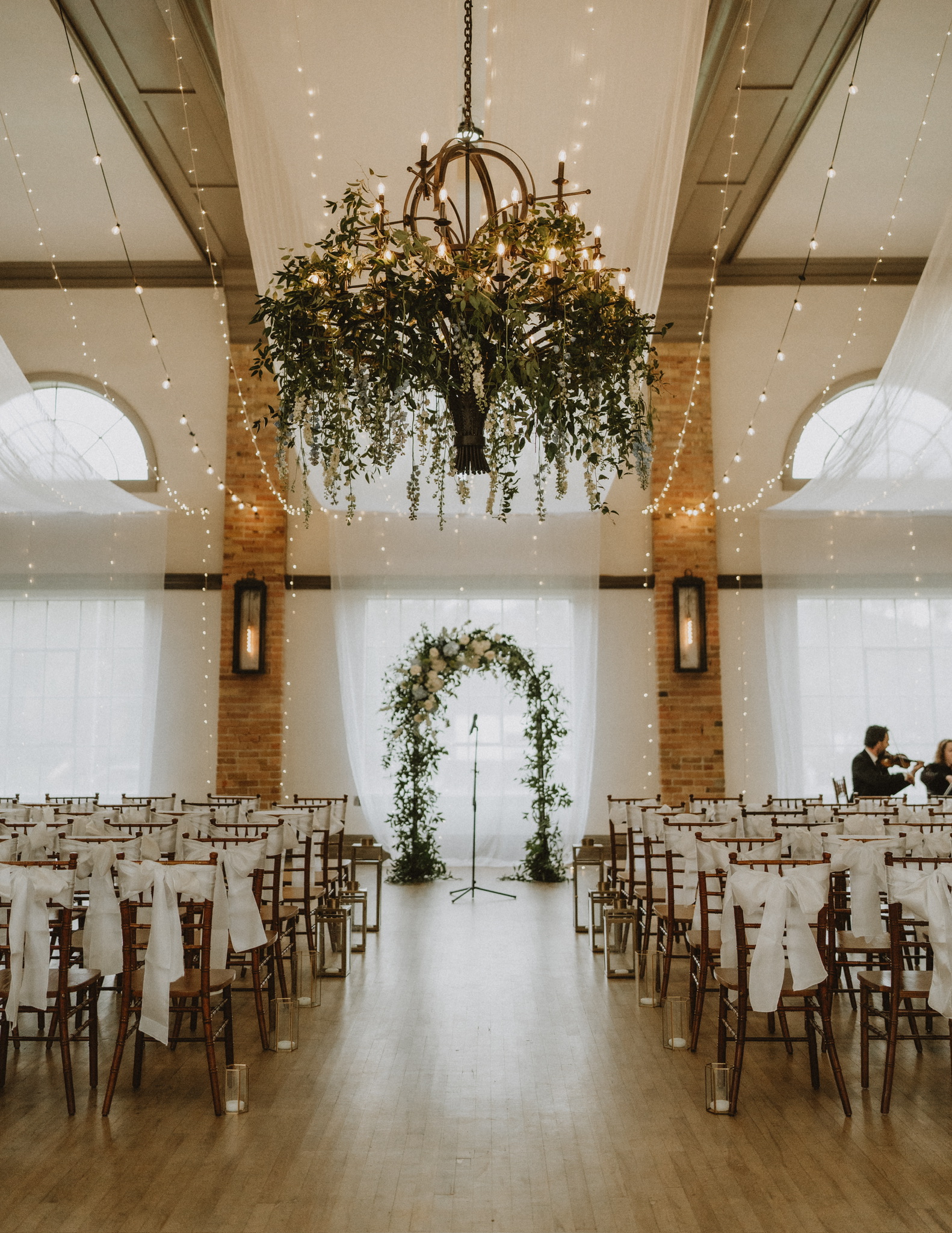 Drapery install for ceremony